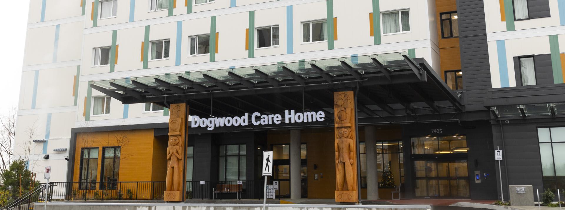 Exterior of the new Dogwood Care Home in South Vancouver with house posts designed by artists Brent Sparrow and Thomas Cannell
