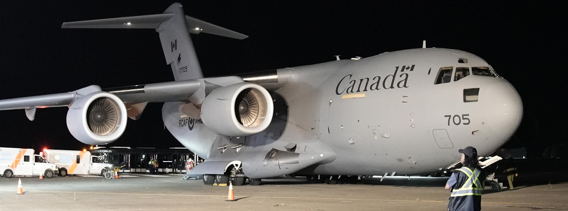 Canadian military aircraft carrying long-term care residents and hospital patients arrives at Vancouver International Airport (credit: Fraser Health Authority)