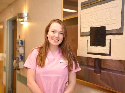 Caroline Frankfurter, RN, standing in a VCH facility.