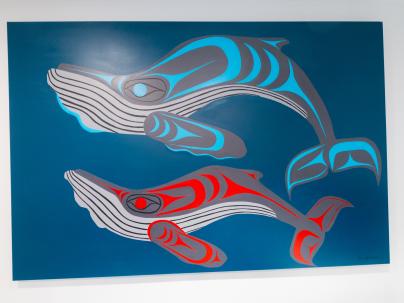 Chris Sparrow, a Coast Salish artist and member of the Musqueam Nation, painted a mural of two humpback whales.