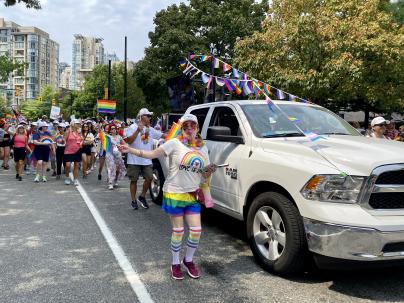 Staff, medical staff, family and friends participate in Vancouver Pride Parade.
