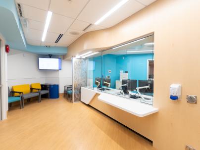 Reception area showing chairs and reception desk.